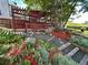 Inviting backyard garden area with a decorative pergola, mature landscaping, and charming outdoor space at 9535 W 104Th Ct, Broomfield, CO 80021