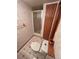 Small bathroom with a stand-up shower, toilet, and tiled floors at 9535 W 104Th Ct, Broomfield, CO 80021