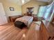 Spacious bedroom is complete with ample wooden furniture, offering plenty of storage and style at 9535 W 104Th Ct, Broomfield, CO 80021