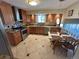 Lovely eat-in kitchen featuring stainless steel appliances and granite countertops at 9535 W 104Th Ct, Broomfield, CO 80021