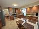 Well-lit eat-in kitchen with stainless steel appliances and tile flooring at 9535 W 104Th Ct, Broomfield, CO 80021