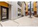 Private patio area with a view of neighboring building at 3225 Blake St # 6, Denver, CO 80205