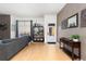 Bright living room features hardwood floors, natural light, and modern decor at 3225 Blake St # 6, Denver, CO 80205