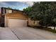Charming two-story home featuring a two-car garage, brick chimney, and well-maintained landscaping at 5506 Irish Pat Murphy Dr, Parker, CO 80134