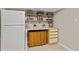 Efficient kitchenette with a refrigerator, counter space, storage, and shelving at 5506 Irish Pat Murphy Dr, Parker, CO 80134