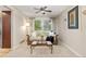Cozy living room featuring a comfortable sofa, natural light, and tasteful decor creating a relaxing atmosphere at 5506 Irish Pat Murphy Dr, Parker, CO 80134