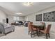 Inviting living room with comfortable seating, a games table, and stylish decor at 5506 Irish Pat Murphy Dr, Parker, CO 80134