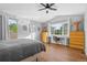 Spacious bedroom featuring a ceiling fan, vaulted ceilings, and lots of natural light at 1464 Spotted Owl Way, Highlands Ranch, CO 80129