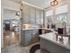 Charming kitchen with updated cabinets, marble countertops and stainless steel appliances at 6940 W 48Th Ave, Wheat Ridge, CO 80033