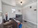 Bright mud room offering tile floors, natural light and built-in storage at 6940 W 48Th Ave, Wheat Ridge, CO 80033