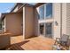 The back porch has wood floors and a place to sit outside at 29089 Western Ln, Evergreen, CO 80439