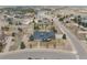 Wide aerial view of the blue two-story home, showcasing the surrounding neighborhood and landscapes at 5372 Lenox Ct, Castle Rock, CO 80104