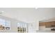Bright kitchen featuring modern cabinets, stainless appliances, recessed lighting, and a large window at 24717 E 40Th Ave, Aurora, CO 80019