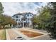 Beautiful backyard with a covered pool, an outdoor seating and eating area, a pergola and lovely landscaping at 9479 S Shadow Hill Cir, Lone Tree, CO 80124