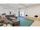 Comfortable basement living room provides a cozy space for relaxation and entertainment at 9479 S Shadow Hill Cir, Lone Tree, CO 80124