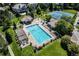 Aerial view of the sparkling community pool, hot tub, and surrounding landscaping at 9479 S Shadow Hill Cir, Lone Tree, CO 80124