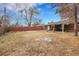 Large backyard with wooden fence at 340 S Swadley St, Lakewood, CO 80228