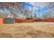 Backyard with shed and wooden fence at 340 S Swadley St, Lakewood, CO 80228