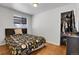 Spacious bedroom with wood floors, a closet, and a double bed at 340 S Swadley St, Lakewood, CO 80228