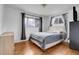 Bedroom with hardwood floors and ample closet space at 340 S Swadley St, Lakewood, CO 80228