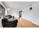Living room with hardwood floors and large windows at 340 S Swadley St, Lakewood, CO 80228
