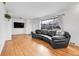 Living room with hardwood floors and large windows at 340 S Swadley St, Lakewood, CO 80228