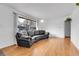 Living room with hardwood floors and large windows at 340 S Swadley St, Lakewood, CO 80228