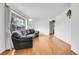 Living room with hardwood floors and large windows at 340 S Swadley St, Lakewood, CO 80228