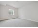 Unfinished basement bedroom with a window and neutral walls at 17811 E 93Rd Ave, Commerce City, CO 80022