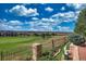 Expansive backyard with stunning views of the golf course and surrounding community at 6638 S Tibet Ct, Aurora, CO 80016