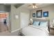 Inviting bedroom with a cozy bed, ceiling fan, and closet space at 6638 S Tibet Ct, Aurora, CO 80016