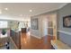 Elegant foyer with hardwood floors, neutral walls, and an open view to living areas at 6638 S Tibet Ct, Aurora, CO 80016