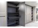 Spacious closet with ample storage, featuring drawers and shelving at 3461 S Ivy Way, Denver, CO 80222