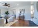 Inviting living room with hardwood floors, stylish decor, and an open layout at 3461 S Ivy Way, Denver, CO 80222