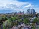 Scenic aerial view of a residential area with the city skyline in the background at 458 S Downing St, Denver, CO 80209