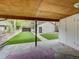 View from under covered deck showing the backyard and garage at 458 S Downing St, Denver, CO 80209