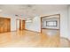 Open living room with hardwood floors, ceiling fan, and natural light at 458 S Downing St, Denver, CO 80209