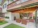 Covered patio with outdoor seating and brick accents at 458 S Downing St, Denver, CO 80209