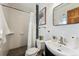 Modern bathroom with white tile shower and sleek vanity at 9019 Armadillo Trl, Evergreen, CO 80439