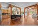 Spacious kitchen with wooden beams, large island with seating, and view to living spaces at 1420 Sierra Dr, Boulder, CO 80302