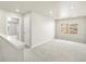 Bright bonus room with neutral carpet, large window for natural light, and easy access to other areas at 765 N Tibet St, Aurora, CO 80018