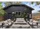 Stylish backyard with a firepit and modern outdoor seating, perfect for gatherings at 2533 N Emerson St, Denver, CO 80205