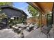 Inviting backyard patio with a modern seating area, fire pit, and stylish outdoor decor for relaxing or entertaining at 2533 N Emerson St, Denver, CO 80205