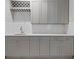 Elegant bar area featuring custom cabinetry, a wine rack, and ample counter space for entertaining at 2533 N Emerson St, Denver, CO 80205