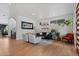 Spacious living room with hardwood floors, modern furniture, and plenty of natural light at 2533 N Emerson St, Denver, CO 80205