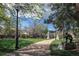 Beautiful community park featuring lush green spaces, walking paths, and memorial statues at 2711 Mapleton Ave # 27, Boulder, CO 80304