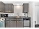 Bright kitchen showcasing modern appliances, sleek countertops, and white subway tile backsplash for a stylish culinary experience at 2711 Mapleton Ave # 27, Boulder, CO 80304