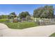 A view of the community garden and natural gathering area in a well-maintained community park at 11839 E Maplewood Ave, Greenwood Village, CO 80111
