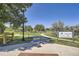 Scenic community park with walking path and signage on a clear day at 11839 E Maplewood Ave, Greenwood Village, CO 80111
