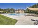 The community offers a beautiful pool with surrounding shade and seating areas at 11839 E Maplewood Ave, Greenwood Village, CO 80111